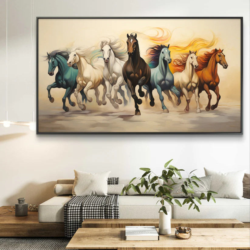 Framed artwork of horses running on a wall in a living room.