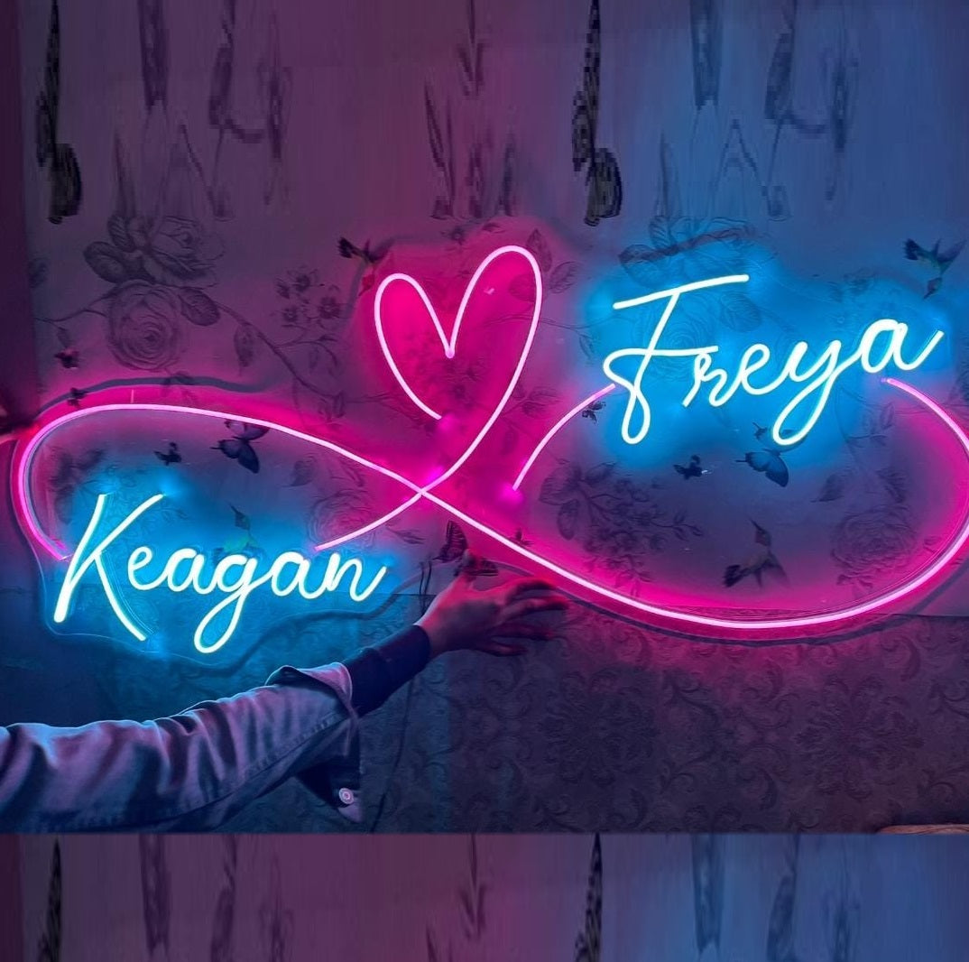 Couples Name Neon Light | Customized Neon Gift for Anniversary Neon sign with 'Keagan' and 'Freya' on a patterned wall