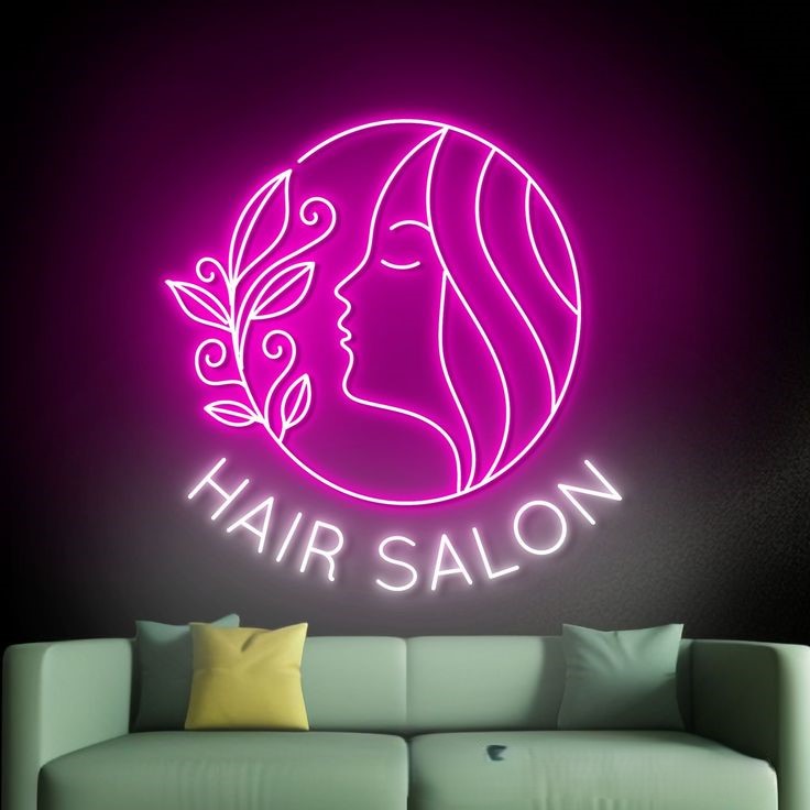 Girls Hair Salon Neon Sign | Custom Neon Sign | Neon for Saloon Neon sign of a hair salon logo on a dark background with a green sofa.