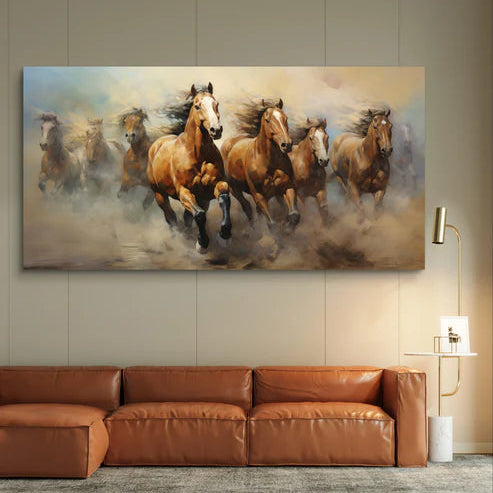 Painting of running horses on a wall above a brown leather sofa.