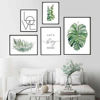 Modern gallery wall canvas featuring botanical artwork and inspirational typography for living room