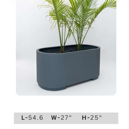 54.6 inch long charcoal grey rectangular planter box with modern minimalist design and tropical palm plants for contemporary home entrance