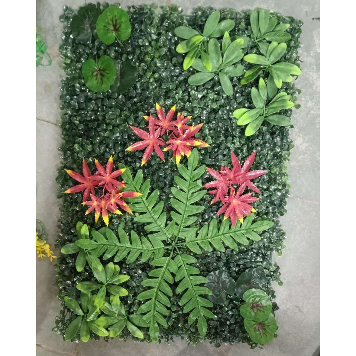Artificial Vertical Garden, Artificial Wall Flower for Wall Decor | Artificial Green Wall Hanging Plants | Wall Decoration (16 by 24 Inches) Artificial greenery panel with red flowers on a gray background