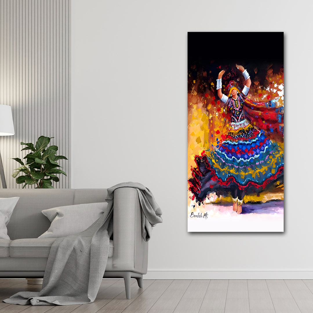 Canvas Painting Wall Frame | Celebration of Colors Ethnic Dancer Painting | Festive Indian Wall Frame (18x24 Inches) Colorful abstract painting of a dancer on a white wall above a gray sofa.