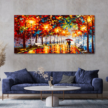 Canvas Painting Wall Frame Couples Walking in Rainy Night | Big Large Size Canvas Landscape Painting Wall Frame (48x24 Inches) Colorful abstract painting of a couple under an umbrella in a park, hanging above a blue sofa.