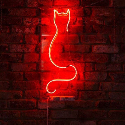 Cat Line Art Neon Sign | Custom Neon Sign | Neon for Living Room Decor Red neon cat-shaped light on a brick wall