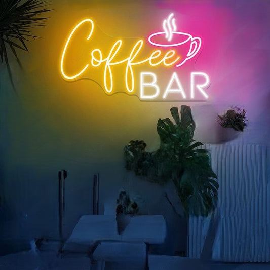 Coffee Bar Neon Sign | Custom Neon Sign | Neon for Bar, Restaurants, Shop Neon sign that reads 'Coffee Bar' with a coffee cup icon, set against a dark background with plants.