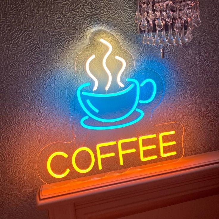 Coffee Cup Neon Sign | Custom Neon Sign | Neon for Restaurants Neon sign of a coffee cup with steam and 'COFFEE' text on a textured glass window.