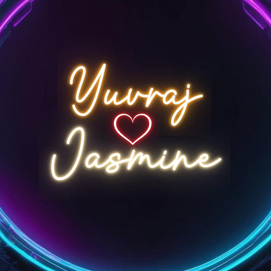 Couples Name Neon Light | Customized Neon Wall Light for Bedroom Neon sign with 'Yuvraj' and 'Jasmine' with a heart in the middle on a dark background.