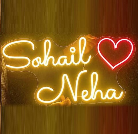 Couples Name Neon Light | Neon Light Board for Wedding Décor Neon sign with 'Sohail' and 'Neha' with a heart symbol on a dark background