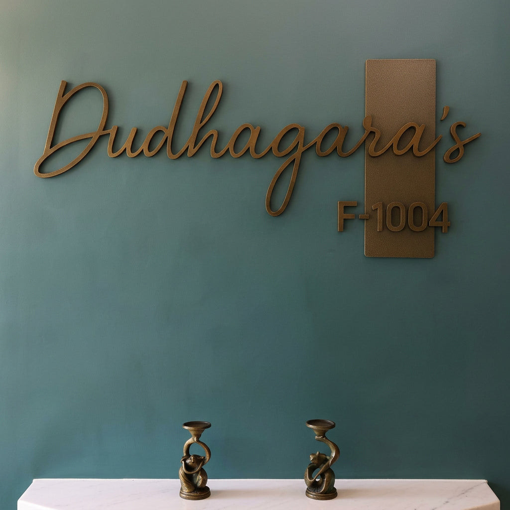 1. Premium personalised home name sign with raised lettering displayed on stone and wooden entrance walls.