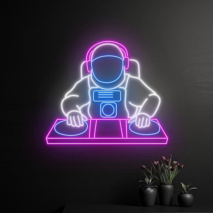 DJ Player Neon Sign | Custom Neon Sign | Neon for Living Room Neon sign of an astronaut DJing with plants on a dark background