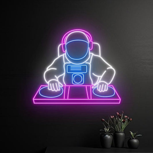 DJ Player Neon Sign | Custom Neon Sign | Neon for Living Room Neon sign of an astronaut DJing with plants on a dark background