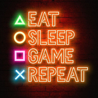 Gaming neon wall sign with colorful symbols and illuminated typography