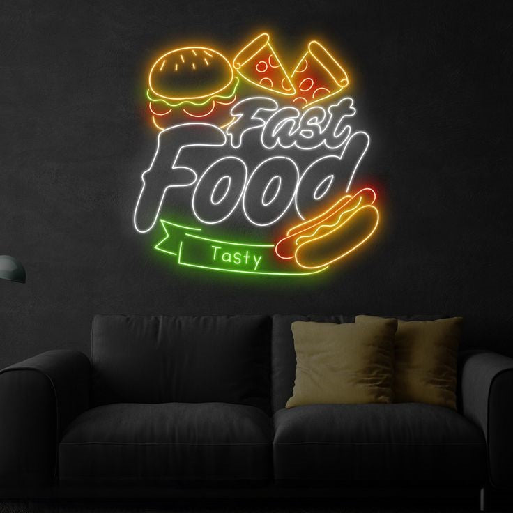 Fast Food Neon Sign | Custom Neon Sign | Neon for Restaurant  Neon sign with fast food graphics and text on a dark wall above a sofa.