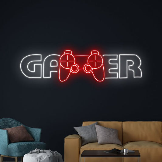 Gamer Remote Neon Sign  – Custom Neon Sign for Game Room 24 By 18 Inches Neon sign spelling 'GAMER' with a gaming controller design above a living room.