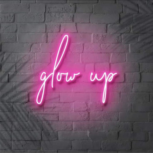 Glow Salon Neon Sign | Custom Neon Sign | Neon for Salon Neon sign with 'glow up' text on a brick wall