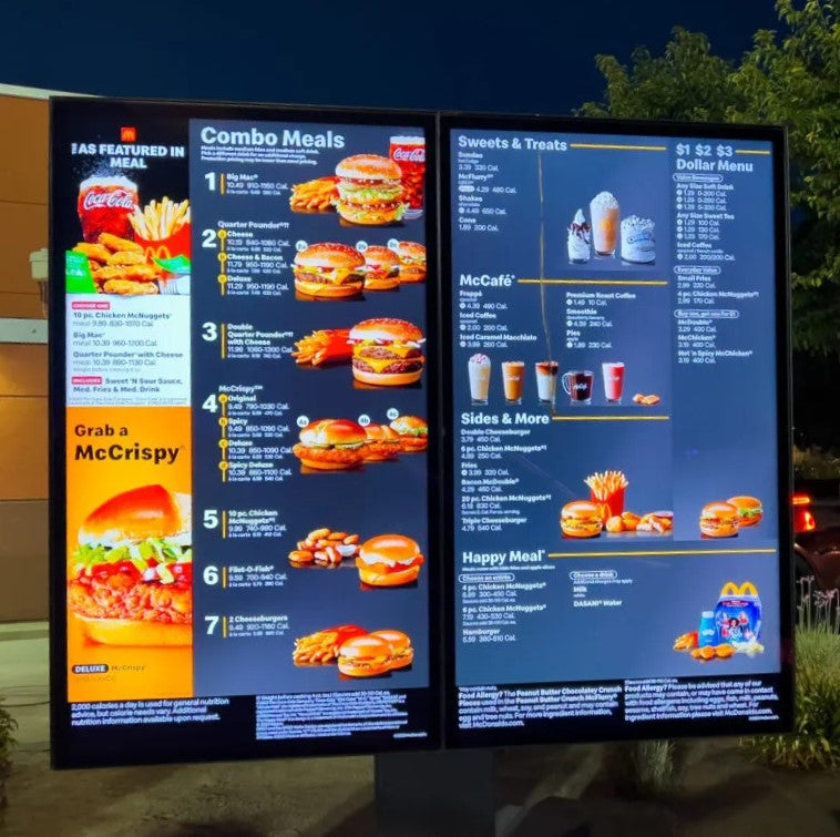 LED Digital Standee Video Display Signage for Branding, Advertising | 24" Table Top Digital Advertising Display Screen | Led Video Standee Digital menu board displaying combo meals and sweets & treats at a fast food restaurant.