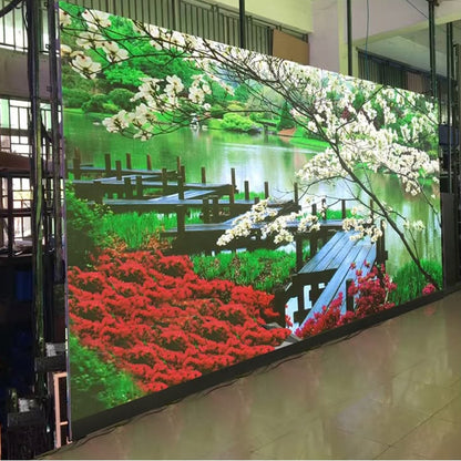 Large backlit fabric wall panel displaying a scenic green lake, flowers and garden landscape