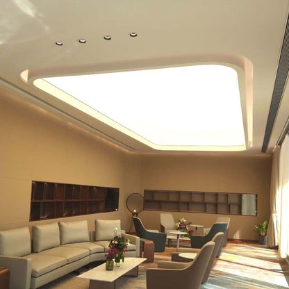 Large curved LED fabric ceiling light panel providing soft white illumination