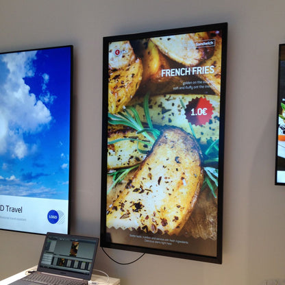 Illuminated vertical LED menu board showing food item, photograph, price and restaurant menu information