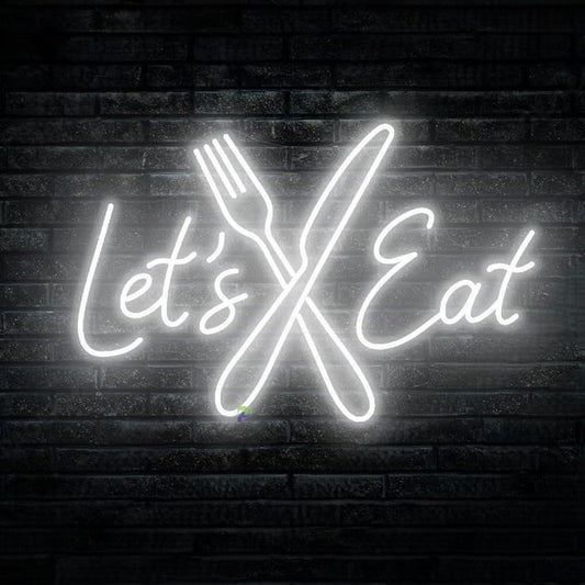 Lets Eat Knife Spoon Neon Sign | Custom Neon Sign | Neon for Restaurants Neon sign with 'Let's Eat' and crossed utensils on a brick wall background