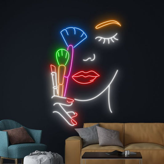 Makeup Kit Neon Sign | Comb Custom Neon Sign | Neon for Salon Neon light art of a face with makeup items on a dark wall in a living room.