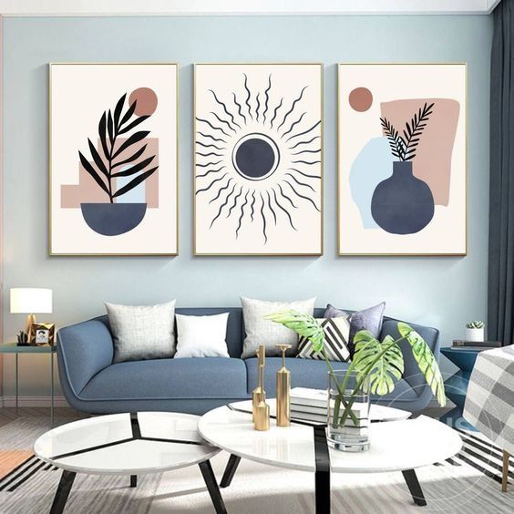Minimalist boho triptych canvas wall decor with abstract vase, botanical leaf, and sun design