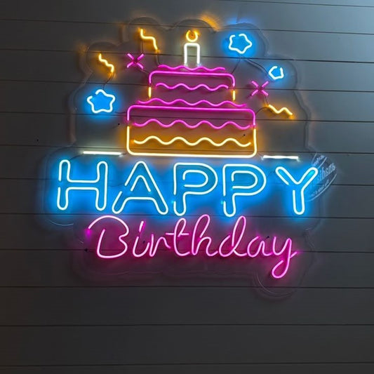 Multicolor Happy Birthday Neon Sign | Custom Neon Sign | Neon for Party Decor Neon sign of a birthday cake with 'Happy Birthday' text on a wooden background