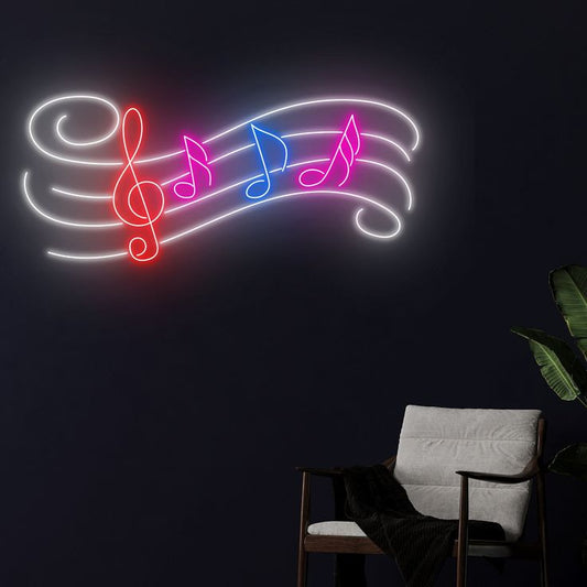 Music Notes Neon Sign | Custom Neon Sign | Neon for Living Room Neon light shaped like musical notes on a dark wall with a chair and plant in the foreground.