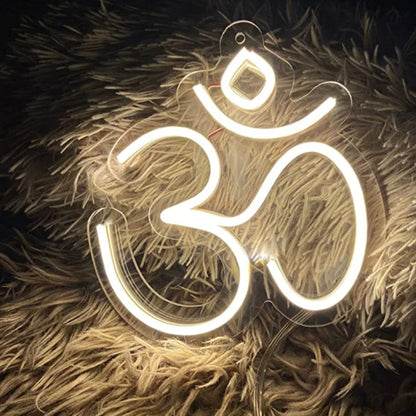 Glowing Om symbol neon light for meditation room and yoga studio decoration
