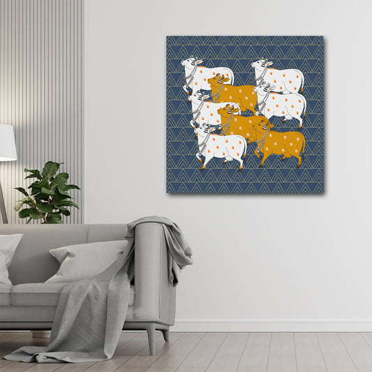 Pichwai Indian Traditional Canvas Wall Art Canvas Frame | Traditional Pichwai Holy Cows Art | Group of Sacred Kamdhenu Modern Wall Art Decors (18x18 Inches) Decorative wall art with cows on a blue geometric pattern in a living room.