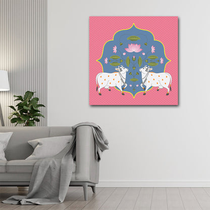 Pichwai Indian Traditional Canvas Wall Art Canvas Frame | Traditional Pink Pichwai Art with Sacred Cows | Symmetric Kamdhenu with Lotus Modern Wall Art Decors (18x18 Inches) Decorative wall art with cows and floral design on a pink background in a living room.