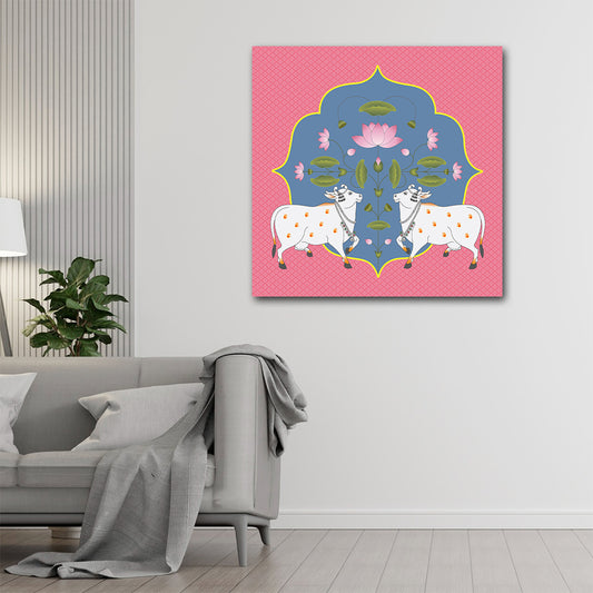 Pichwai Indian Traditional Canvas Wall Art Canvas Frame | Traditional Pink Pichwai Art with Sacred Cows | Symmetric Kamdhenu with Lotus Modern Wall Art Decors (18x18 Inches) Decorative wall art with cows and floral design on a pink background in a living room.