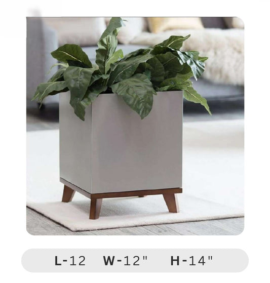 Planters Pots for Decors, Giftings | FRP Pots and Planets for Office Decors White planter with green plant on a wooden stand in a living room setting
