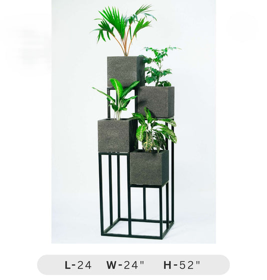 Decorative plant stand with gray cube pots and green plants on a white background
