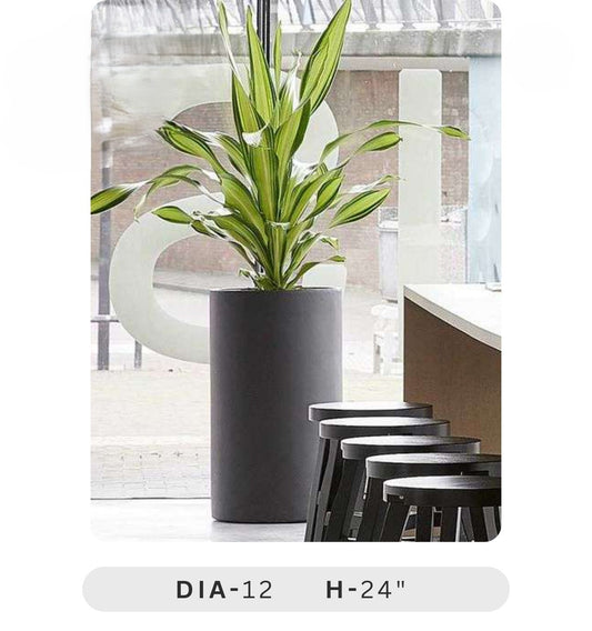 Planters Pots for Decors, Giftings | FRP Pots and Planets for Office Decors Black planter with a plant in a modern indoor setting