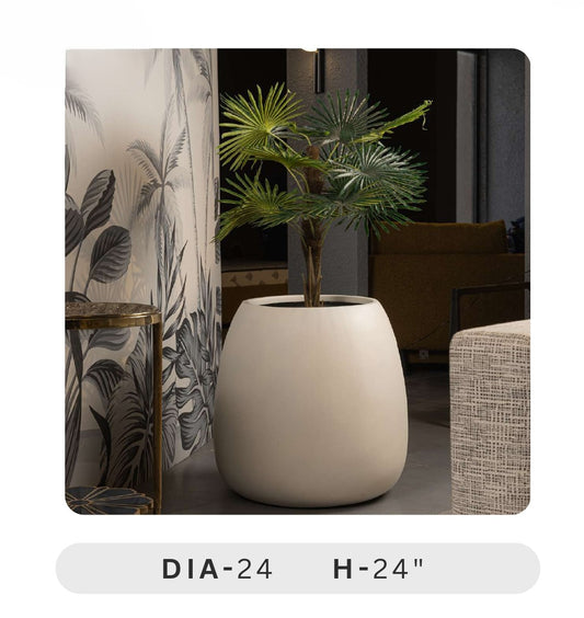 Planters Pots for Decors, Giftings | FRP Pots and Planets for Office Decors Beige planter with a plant in a room setting, featuring a curtain and furniture.