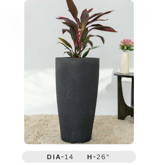 Planters Pots for Decors, Giftings | FRP Pots and Planets for Office Decors Tall dark gray planter with a plant on a beige carpet, with another planter in the background.