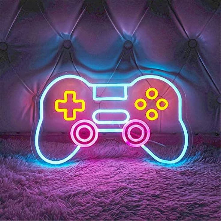 Playstation Remote Neon Sign  – Custom Neon Sign for Game Room 15 By 15 Inches Neon sign shaped like a game controller on a textured surface