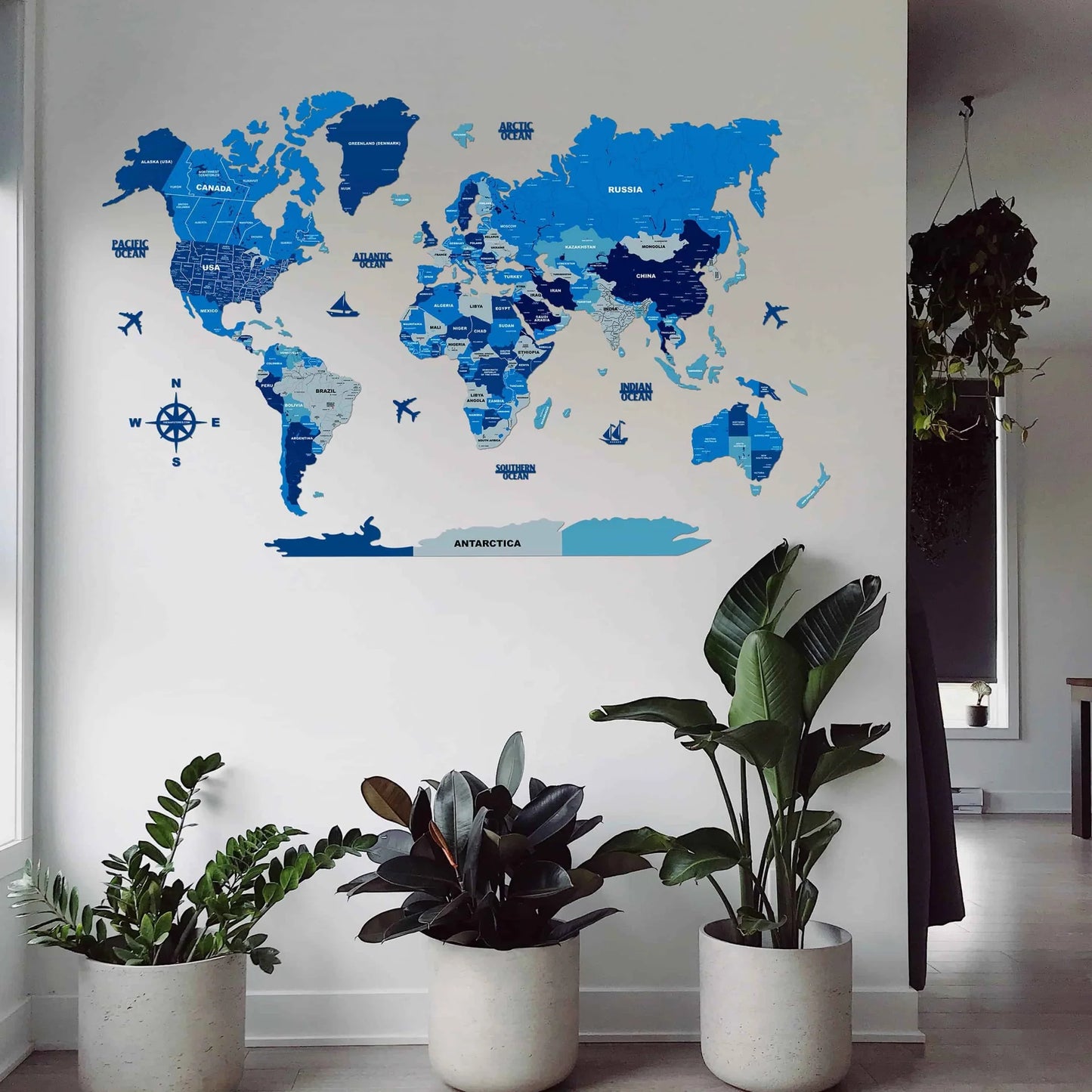 Decorative blue 3D world map wall décor with layered country design for feature walls