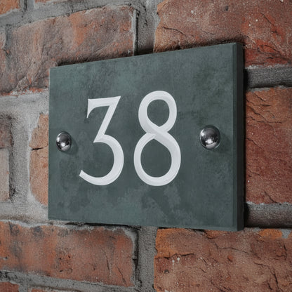 Modern rectangular outdoor address plaque with custom house number and stainless steel fixings