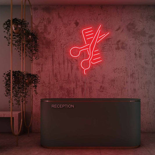 Scissor Comb Neon Sign | Custom Neon Sign | Neon for Salon Decoration Sign Neon sign of a hairbrush and scissors on a textured wall above a reception desk.