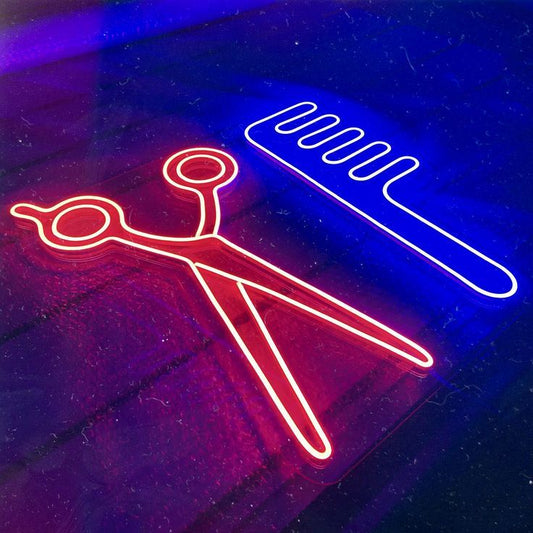Scissors Comb Salon Neon Sign | Custom Neon Sign | Neon for Salon Neon sign of a comb and scissors on a reflective surface with blue and red colors.