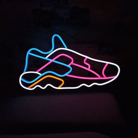 Sneaker Neon Sign | Custom Neon Sign | Neon for Shoes Shop Neon light sculpture of a shoe design on a dark background