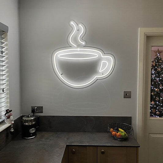 Tea Cup Neon Sign | Custom Neon Sign | Neon for Tea Stall, Cafe, Restaurants Neon sign of a coffee cup on a wall in a room with a Christmas tree.