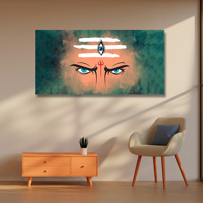 The Third Eye of Lord Shiva Canvas Painting Wall Frame | Big Large Size Canvas Painting Wall Frame (24x24 Inches)
 Abstract artwork of a face with blue eyes and a red bindi on a wall above a wooden cabinet and chair.