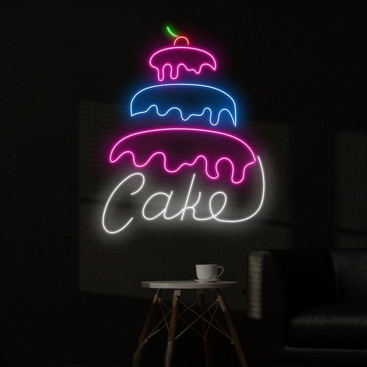 Three Layer Cake Neon Sign – Custom Neon Sign for Living Room Neon sign of a layered cake with 'Cake' text on a dark background