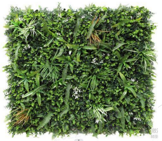 Premium artificial green wall panel featuring tropical leaves and dense foliage for homes and commercial spaces