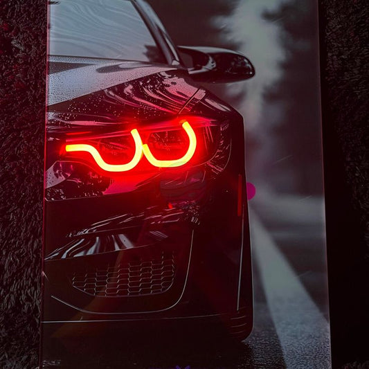 UV Car Eye Neon Sign | Custom Neon Sign | Neon for Detailing Studio Car tail light with red and yellow glow on a dark background
